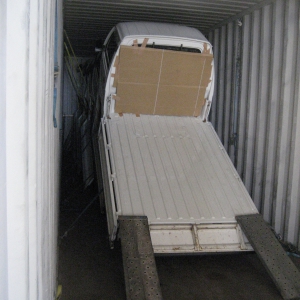 Japanese mini trucks in a 40 ft container